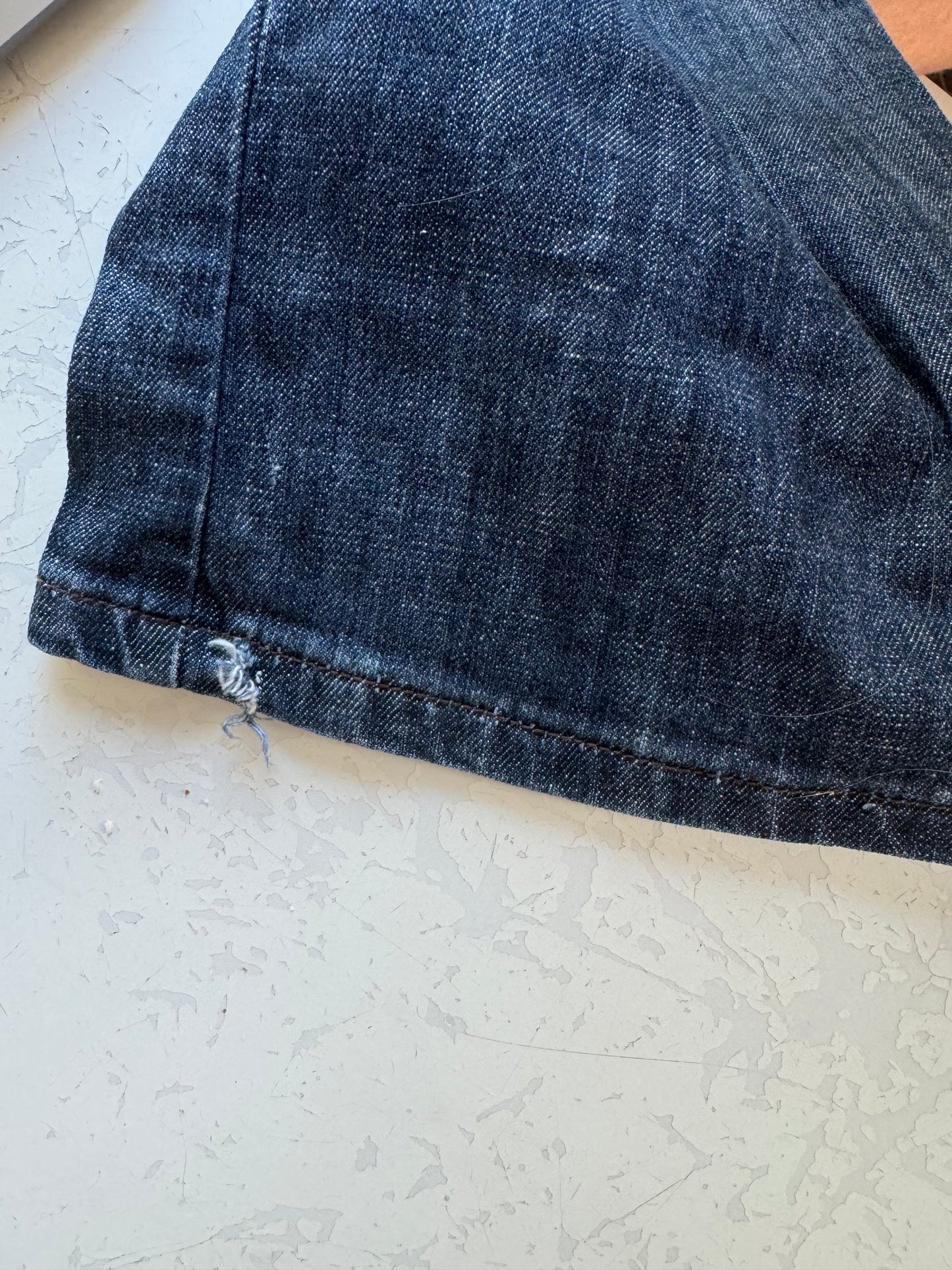 Utsvängda jeans–stl: L