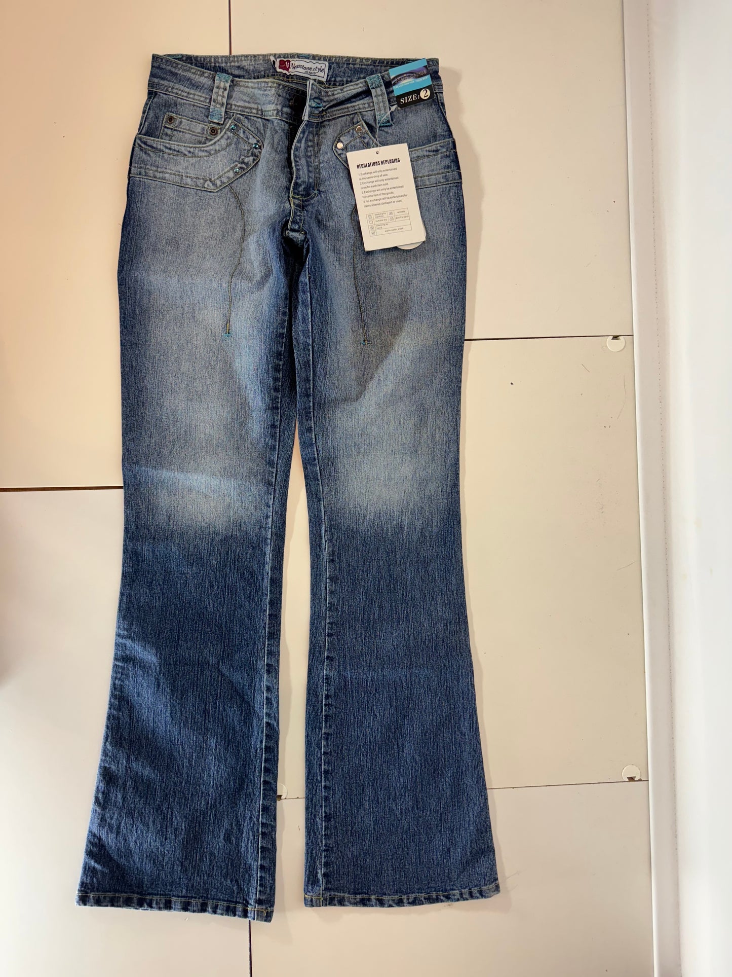 Utsvängda jeans–stl: S