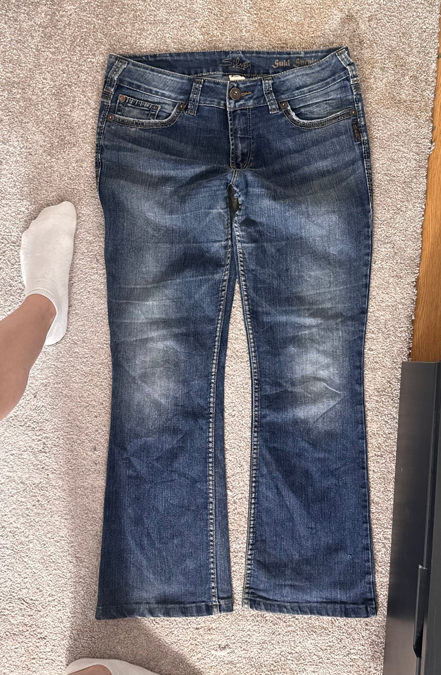 Utsvängda jeans stl: M/L