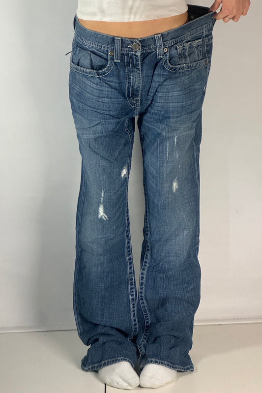 Utsvängda jeans stl: M