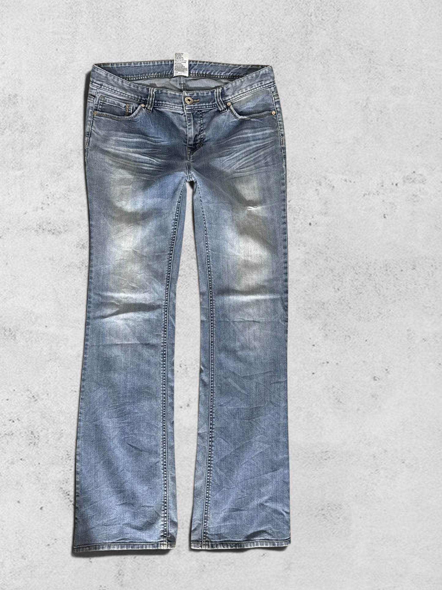 Utsvängda jeans stl: M