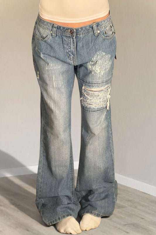 Utsvängda jeans stl: M/L