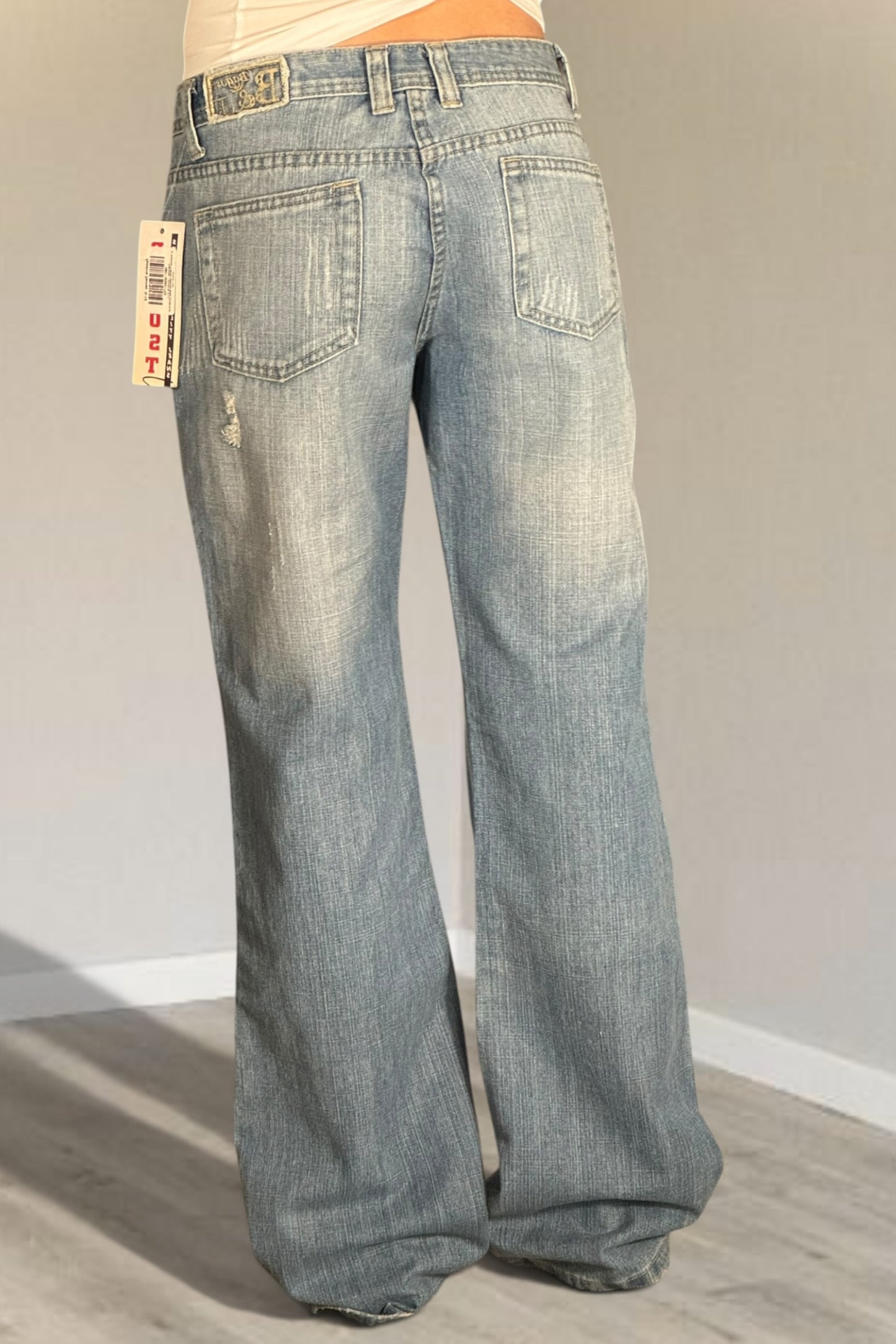 Utsvängda jeans stl: M/L