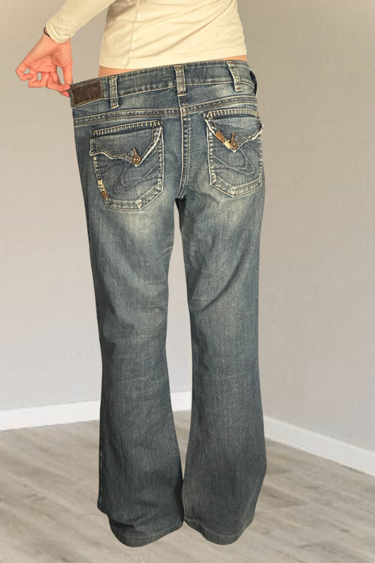 Utsvängda jeans stl: M/L
