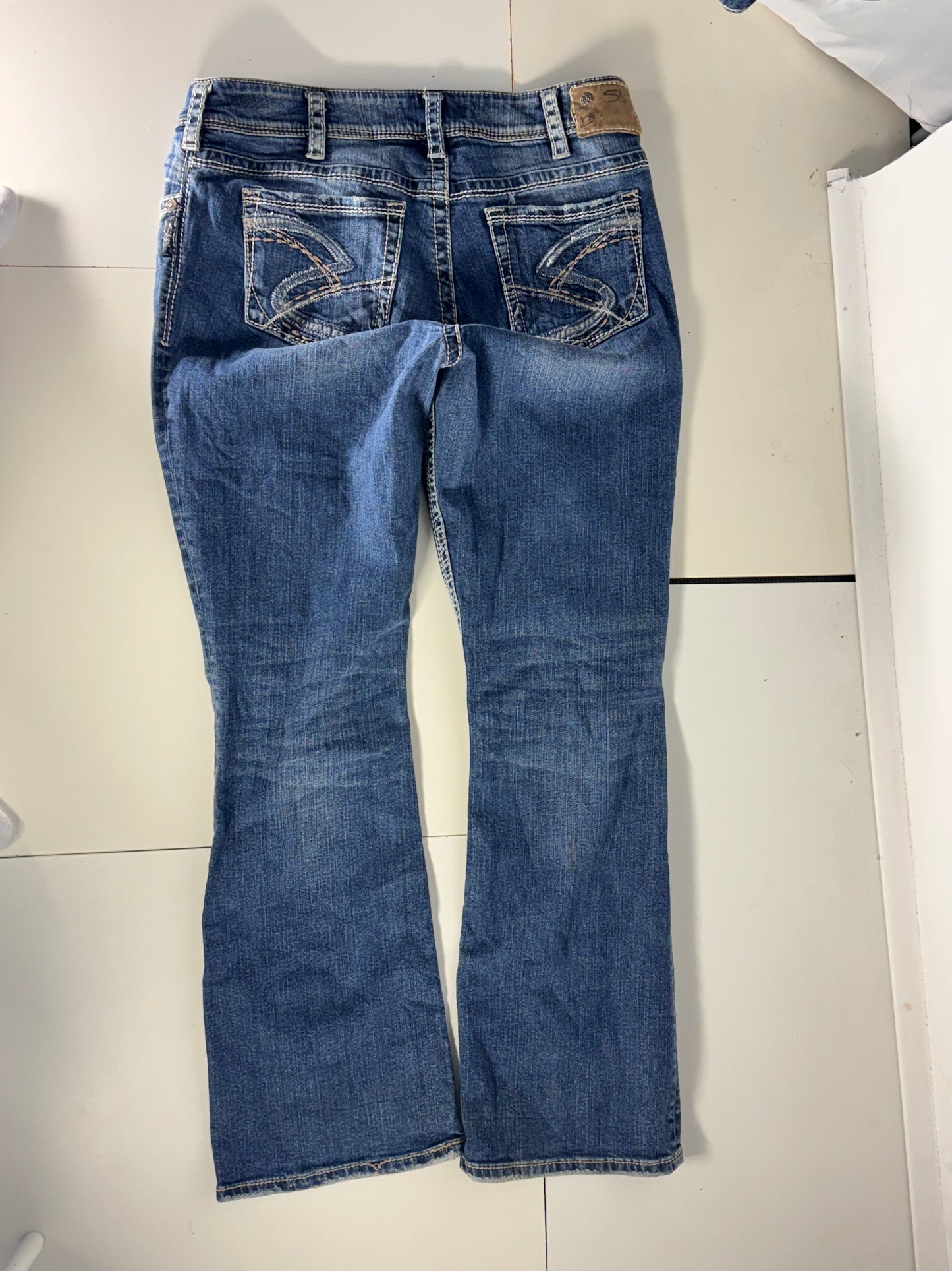 Utsvängda jeans stl: L