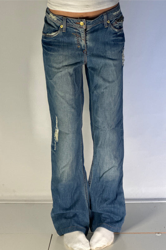 Utsvängda jeans stl: M