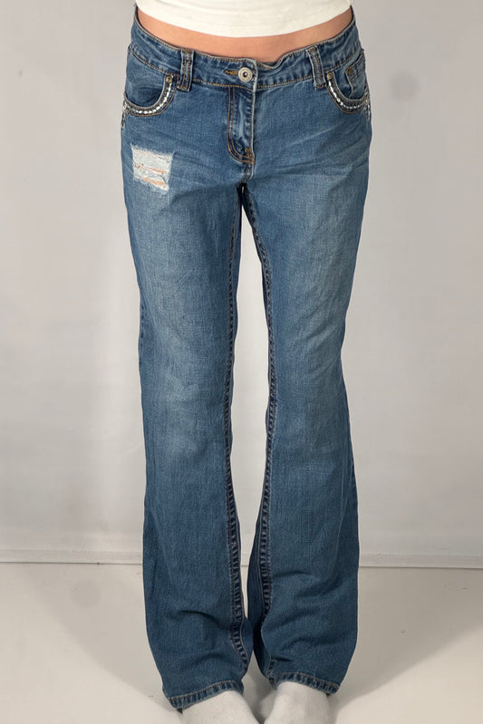 Utsvängda jeans stl: L