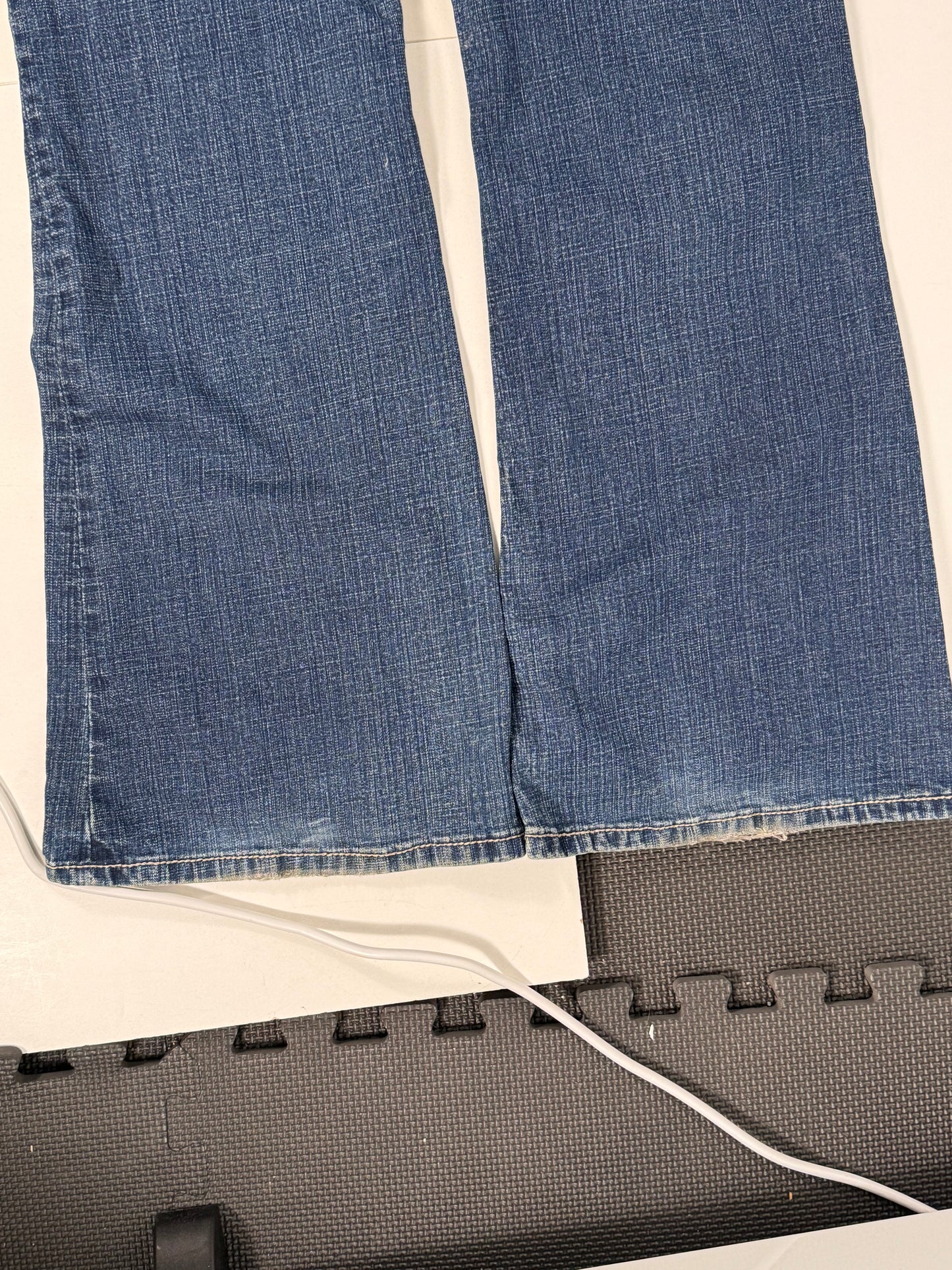 Utsvängda jeans stl: L