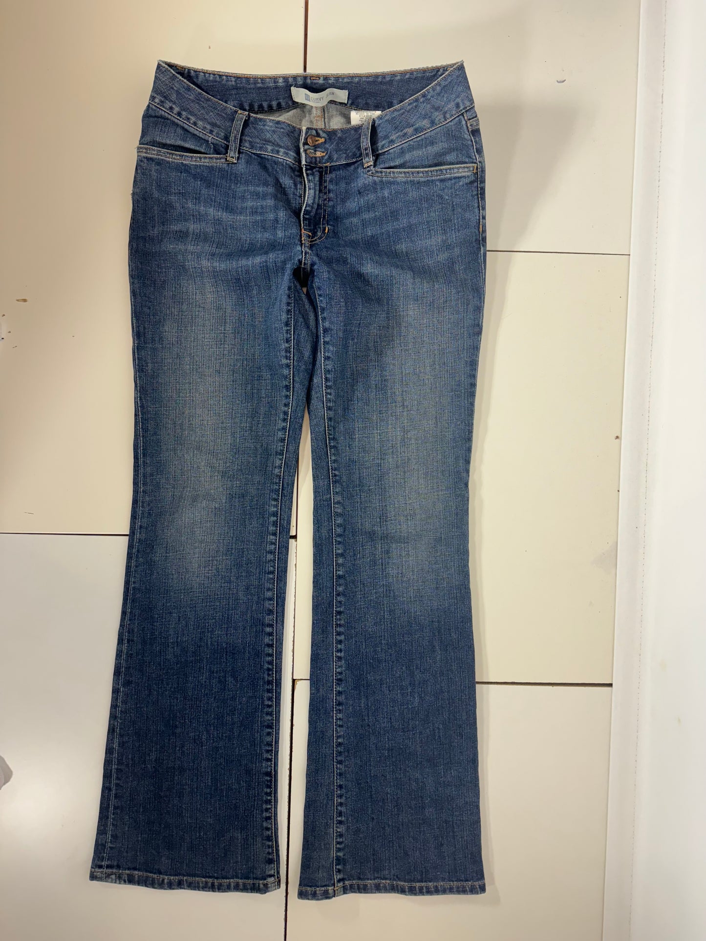 Utsvängda jeans stl: M