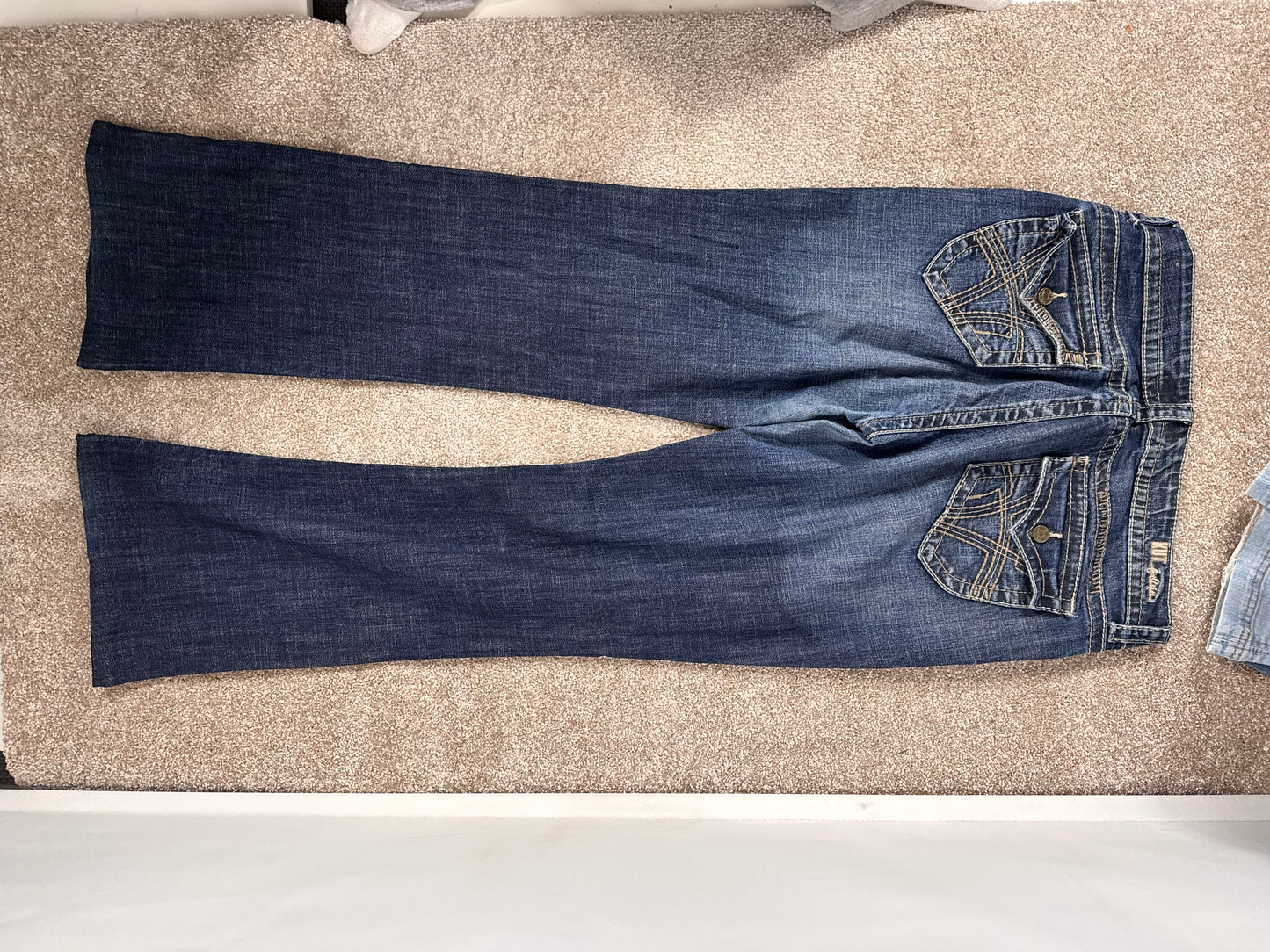 Utsvängda jeans stl: L